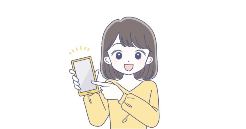 スマホを指差す女性の画像